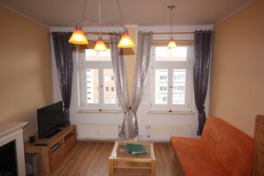 Fernseher, Kamin