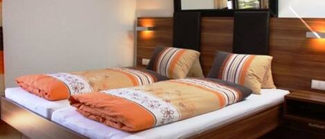 1 bedroom, desk, bed sheets