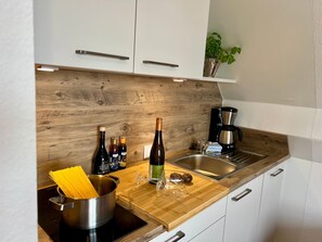 Fridge, microwave, coffee/tea maker, electric kettle