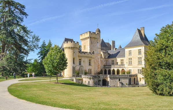 A castle with a central tower, multiple towers, and a large courtyard. - Amazing home in Fleurac (Fleurac)