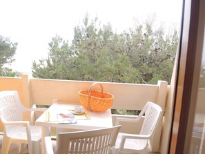 Outdoor dining - Holiday apartment mit Klimaanlage und Balkon (Bibione)