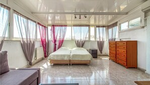 A room with a bed, a dresser, and a sofa. - Amazing home in Orihuela Costa (Orihuela Costa)