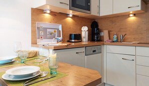 Fridge, microwave, dishwasher, coffee/tea maker