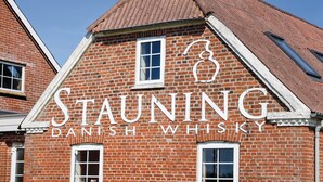 A brick building with the sign "Stauning Danish Whisky" indicating a whisky distillery. - 3 bedroom gorgeous home in Skjern (Skjern)