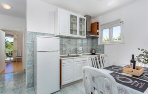 Fridge, stovetop, coffee/tea maker, cookware/dishes/utensils