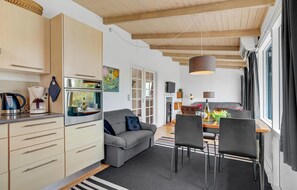 TV, fireplace - Cozy home in Hurup Thy with kitchen (Hurup Thy)