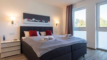 2 slaapkamers, een strijkplank/strijkijzer, wifi, beddengoed