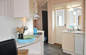 Fridge, stovetop, dishwasher, coffee/tea maker