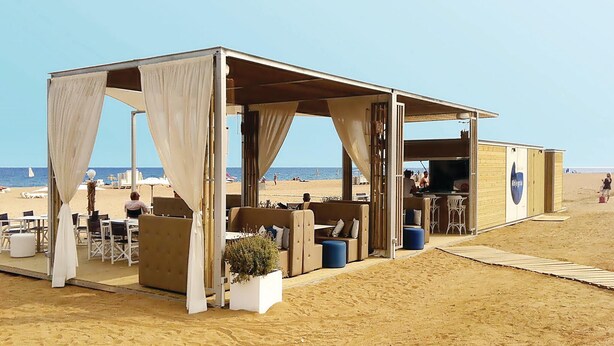 A beachside cabana with outdoor seating, a bar, and a view of the beach. - Pet friendly home in Santa Susanna (Santa Susanna)