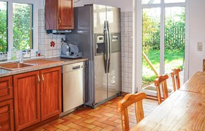 Fridge, stovetop, dishwasher, coffee/tea maker