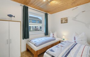 2 bedrooms, travel crib, free WiFi, bed sheets