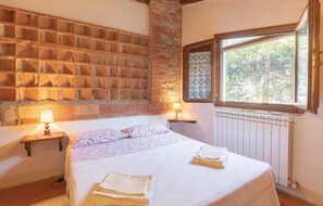 2 quartos, berço de viagem, Wi-Fi de cortesia, roupa de cama