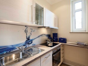 Fridge, oven, dishwasher, highchair