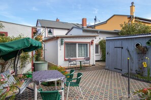 Unclassified image, 2 of 16, button - Apartment in the row of cherries - Apartment (Kröslin)