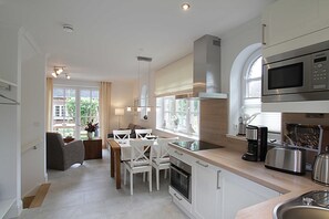 Fridge, microwave, dishwasher, high chair