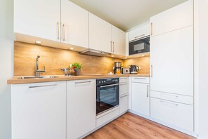 Refrigerador, microondas, horno y lavavajillas 