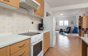 Fridge, stovetop, coffee/tea maker