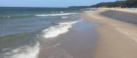On the beach, white sand
