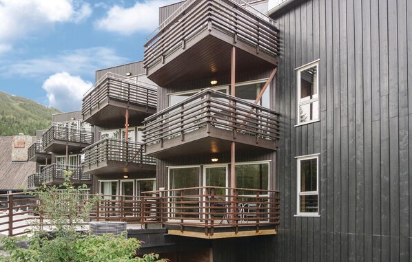 A modern building with multiple balconies and large windows, likely a hotel or resort. - Gorgeous apartment in Hemsedal (Hemsedal)