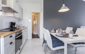 Fridge, stovetop, coffee/tea maker