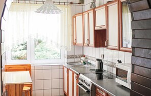 Fridge, microwave, stovetop, cookware/dishes/utensils