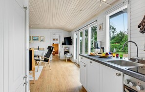Fridge, stovetop, dishwasher, coffee/tea maker