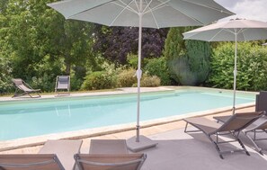 Outdoor pool, a heated pool, sun loungers