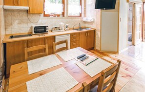 Fridge, stovetop, coffee/tea maker, cookware/dishes/utensils