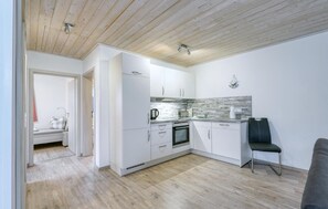 Fridge, stovetop, dishwasher, coffee/tea maker
