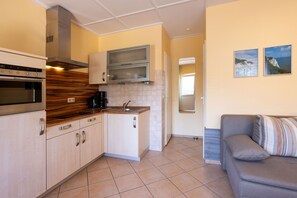 Fridge, microwave, high chair