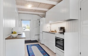 Fridge, stovetop, dishwasher, coffee/tea maker