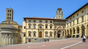A historic building with a central courtyard, a bell tower, and a dome structure. - 3 bedroom amazing home in Anghiari -AR- (Anghiari -AR-)
