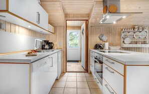 Fridge, stovetop, dishwasher, coffee/tea maker