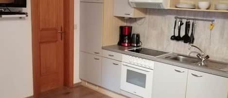 Fridge, oven, high chair
