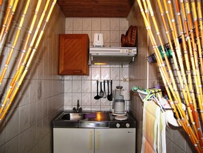 Fridge, coffee/tea maker, electric kettle, toaster