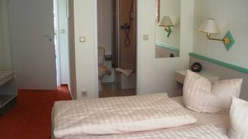 1 bedroom, desk, travel crib, bed sheets