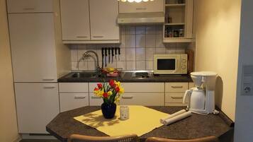 Fridge, microwave, coffee/tea maker, electric kettle