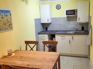 Imagen sin descripción, 4 de 7, botón