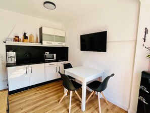 Fridge, microwave, coffee/tea maker, electric kettle