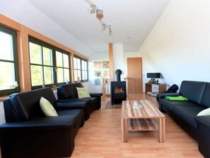 TV, fireplace - Holiday House Darßblick - Holiday home Darßblickam Bodden (Saal)