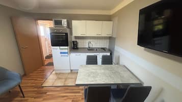 Fridge, microwave, oven, cookware/dishes/utensils