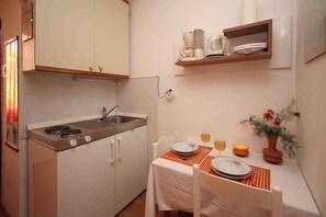 Microwave, stovetop, coffee/tea maker, toaster