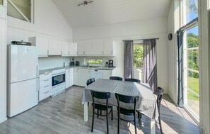 Fridge, stovetop, dishwasher, coffee/tea maker