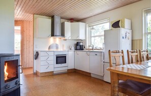 Fridge, stovetop, dishwasher, coffee/tea maker