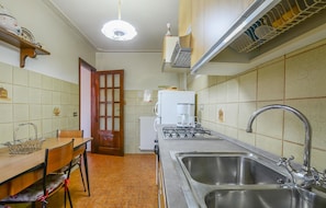 Fridge, stovetop, cookware/dishes/utensils