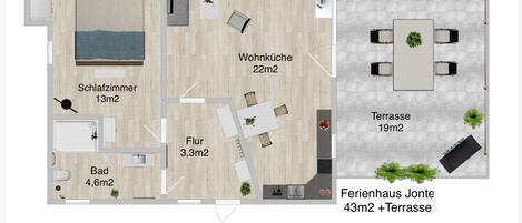 A floor plan of a maisonette with a living room, bedroom, bathroom, and terrace.