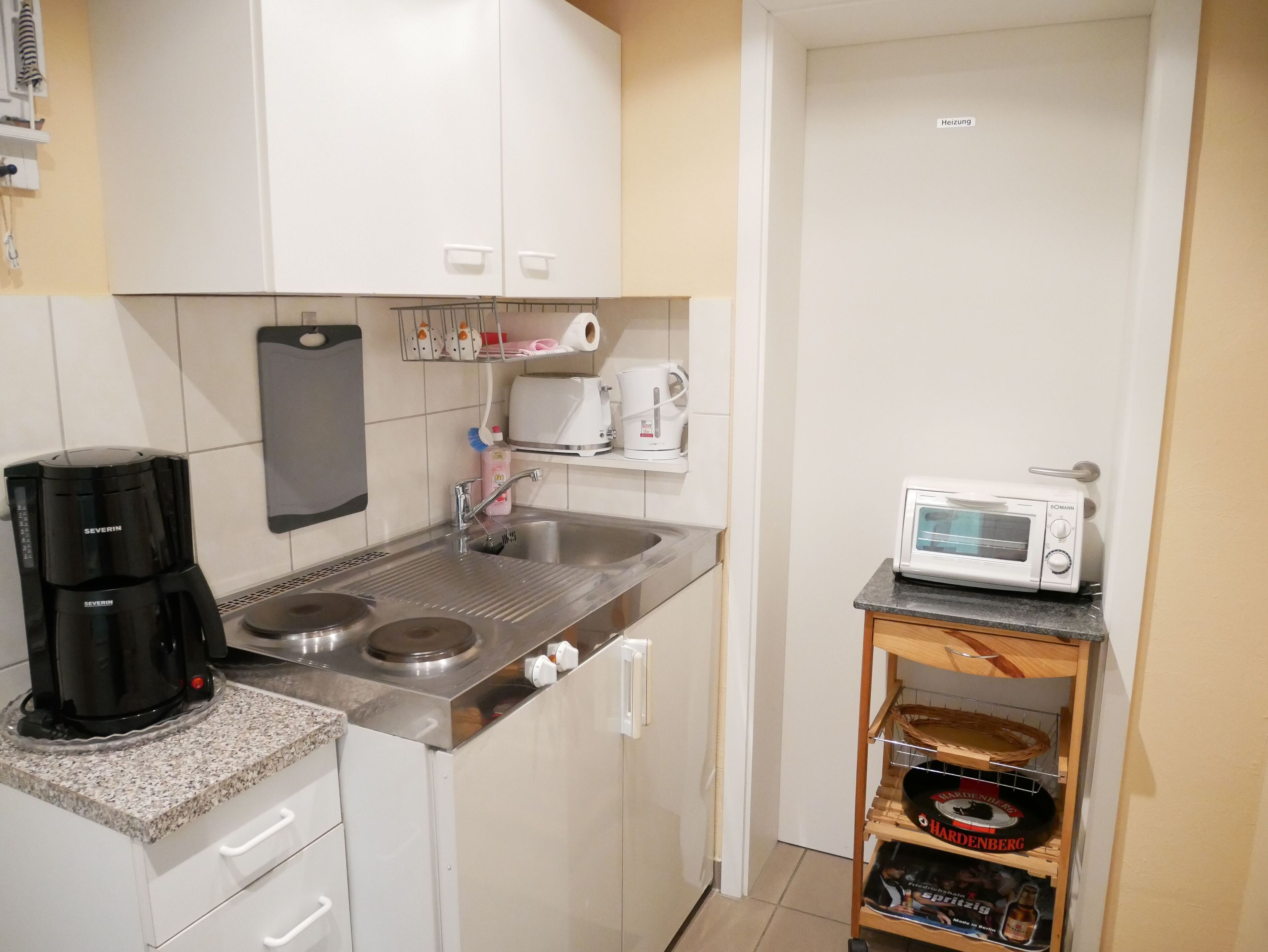 Fridge, coffee/tea maker, electric kettle, toaster