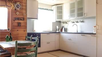Fridge, stovetop, dishwasher, coffee/tea maker