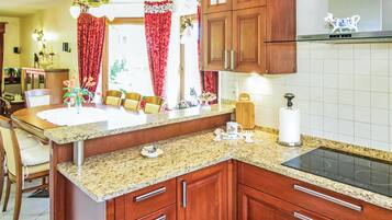 Fridge, stovetop, cookware/dishes/utensils