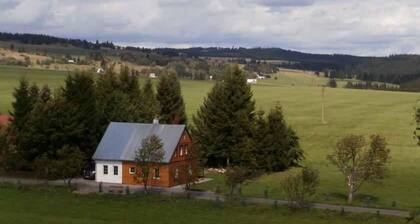 Casa de vacaciones rodeada de prados
